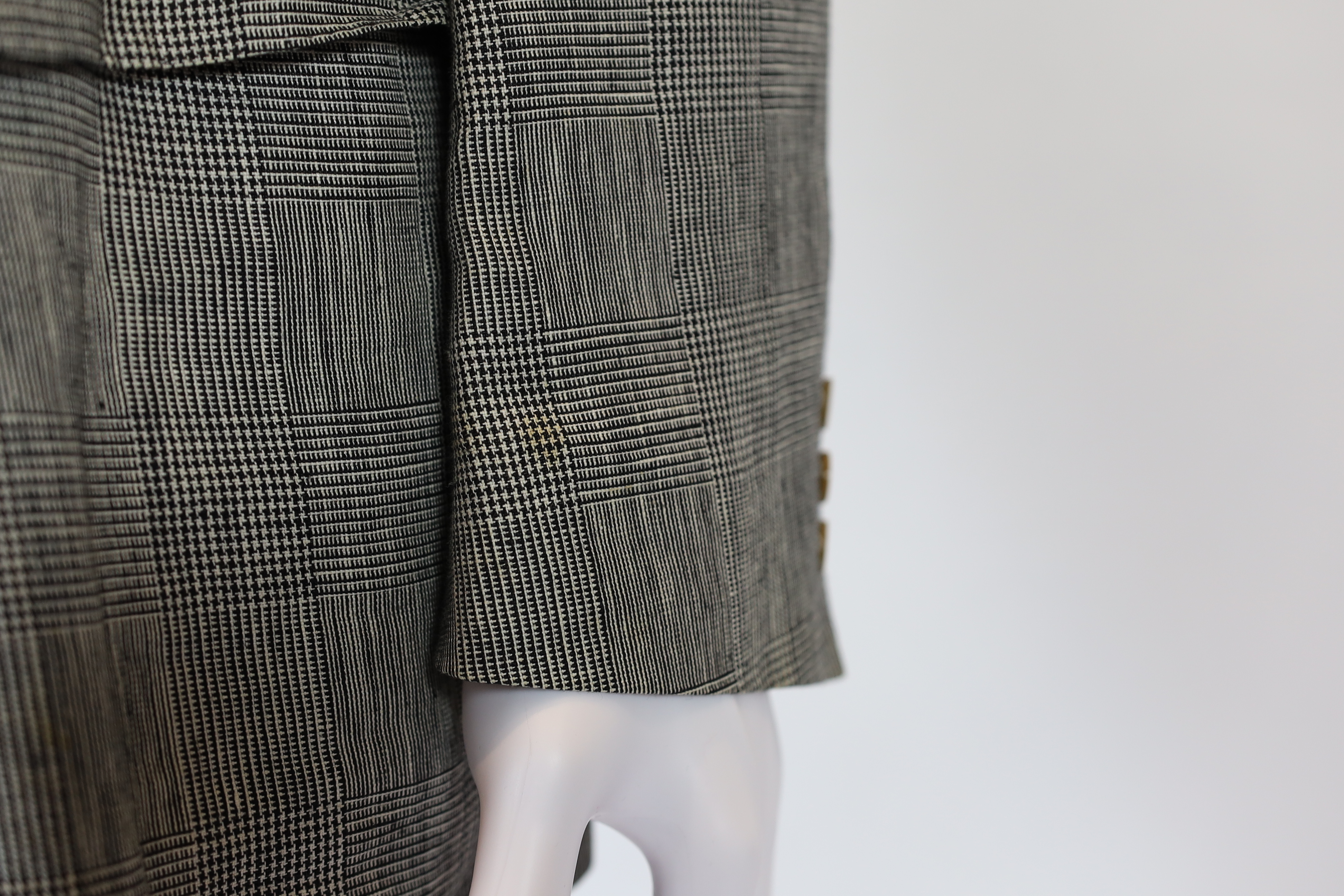 A Saint Laurent rive gauche gentlemen's Prince of Wales check double breasted linen suit, approx size 42